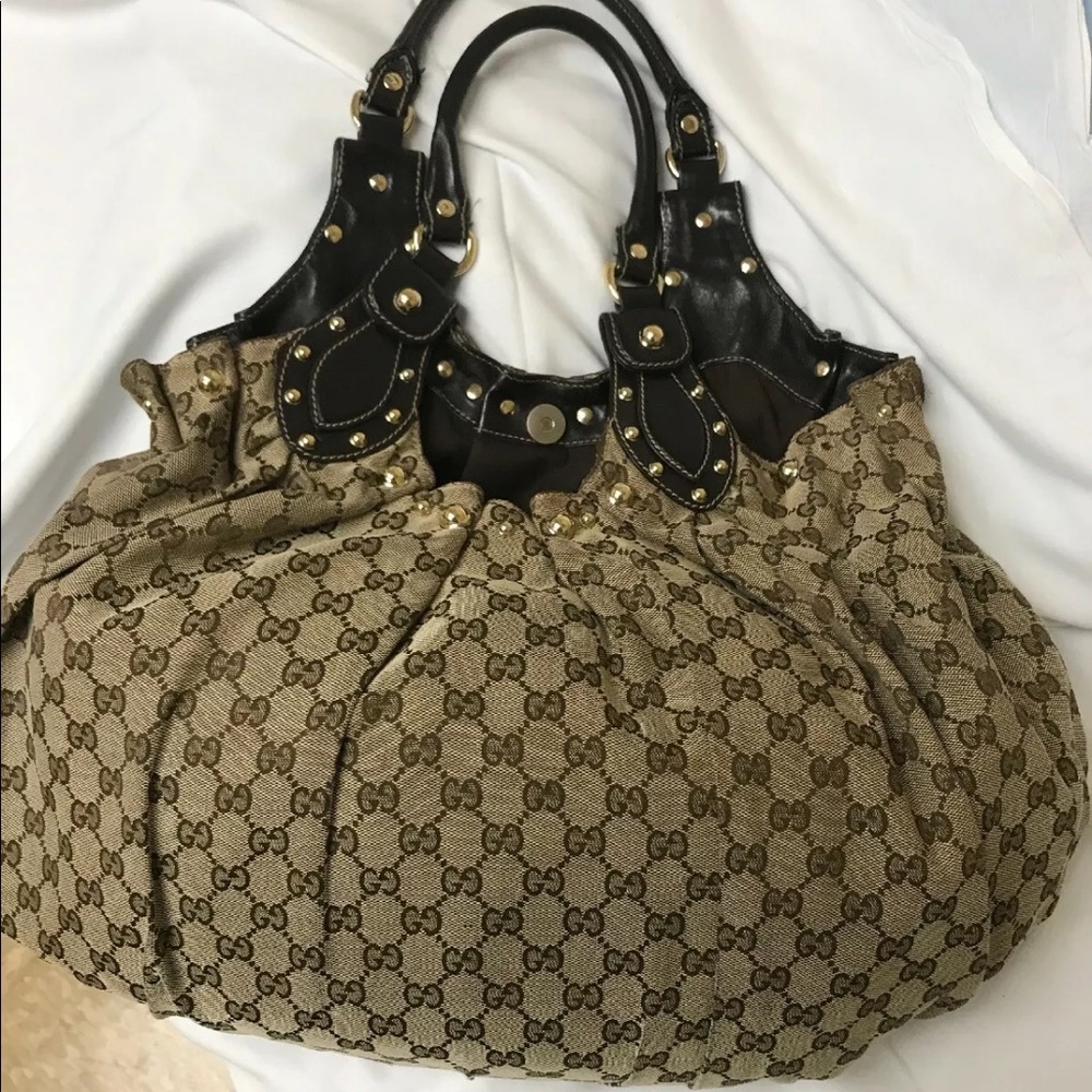 Authentic Gucci Studded Pelham handbag.